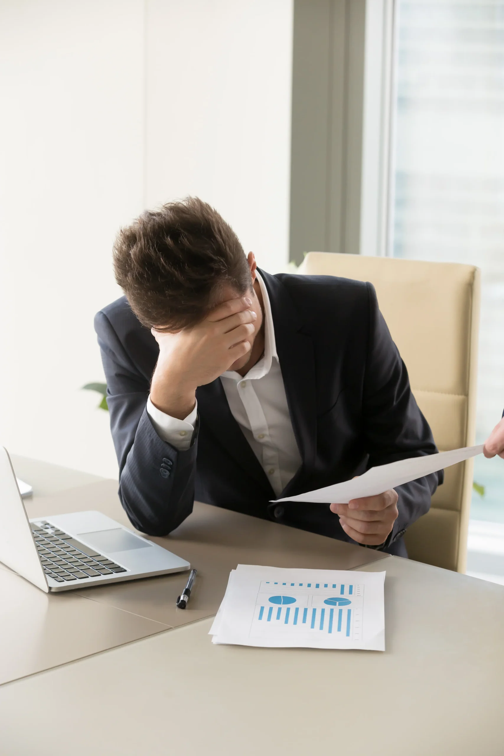 Business owner analyzing financial risks